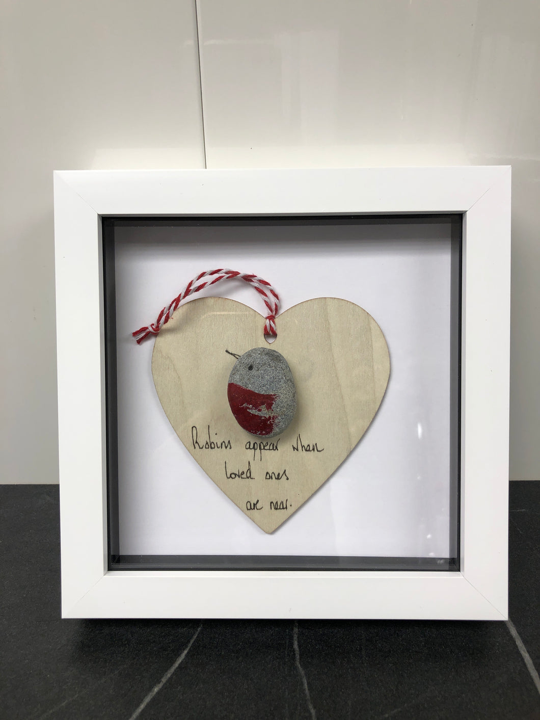 Robins appear when loved ones are near ( glass front)